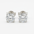 Diamond stud earrings round brilliant cut white gold setting
