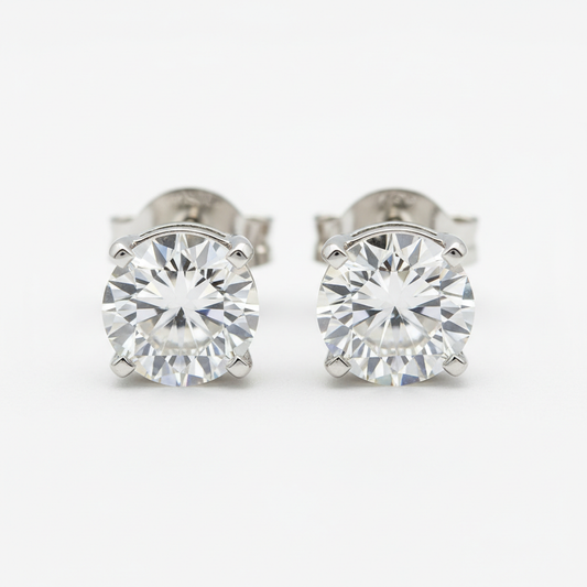 Diamond stud earrings round brilliant cut white gold setting