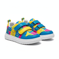 Colorful kids sneakers with velcro straps on white background