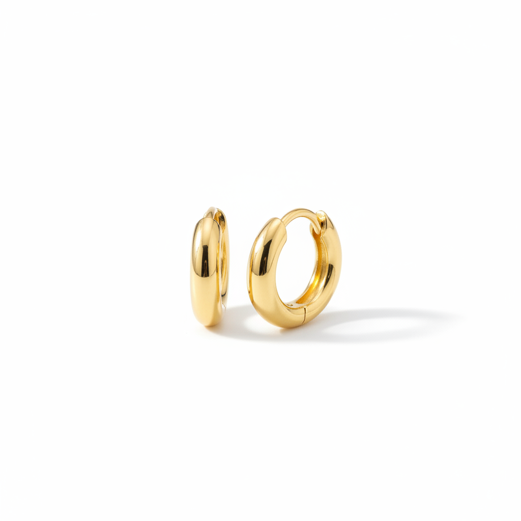 Gold huggie hoop earrings small close-fitting polished finish