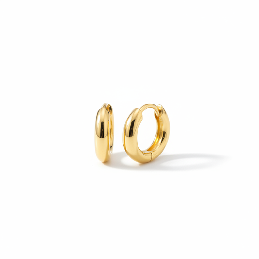Gold huggie hoop earrings small close-fitting polished finish