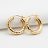 Diamond-cut gold hoop earrings faceted sparkling finish